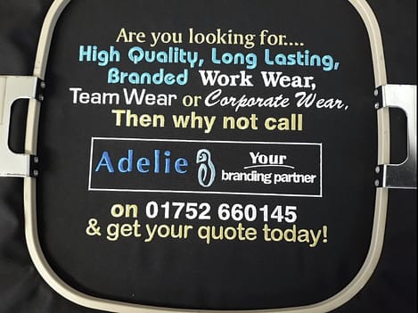 Custom embroidered advertisement for Adelie Branding