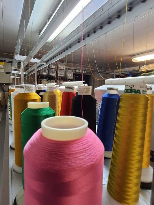 Embroidery machine thread reels
